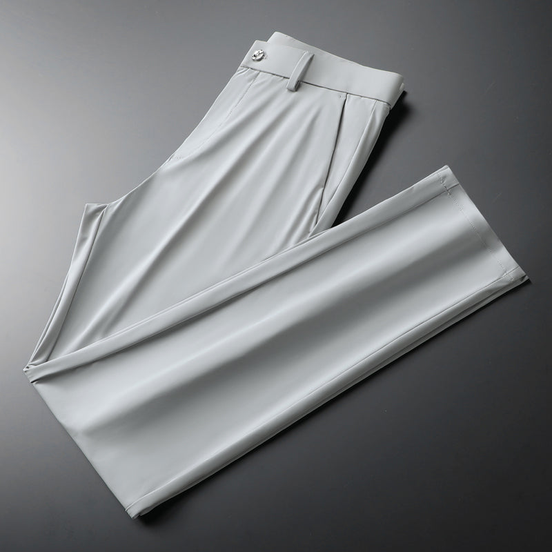 Detail of waistband and pockets on men's black slim fit stretch trousers, practical & stylish.