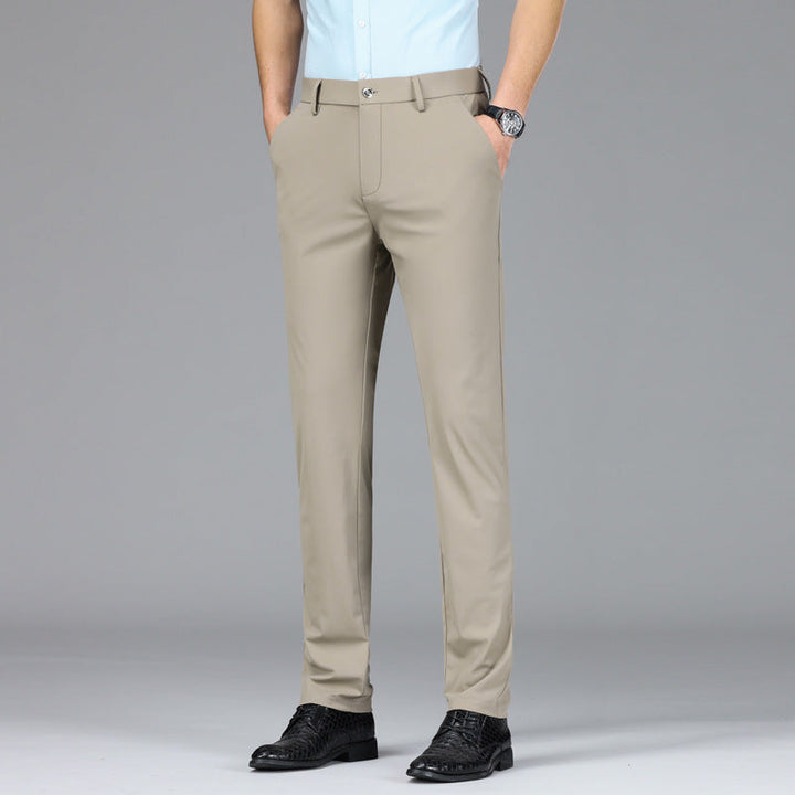 Men's versatile slim fit performance pants. Breathable, stretchable gray trousers for any occasion.