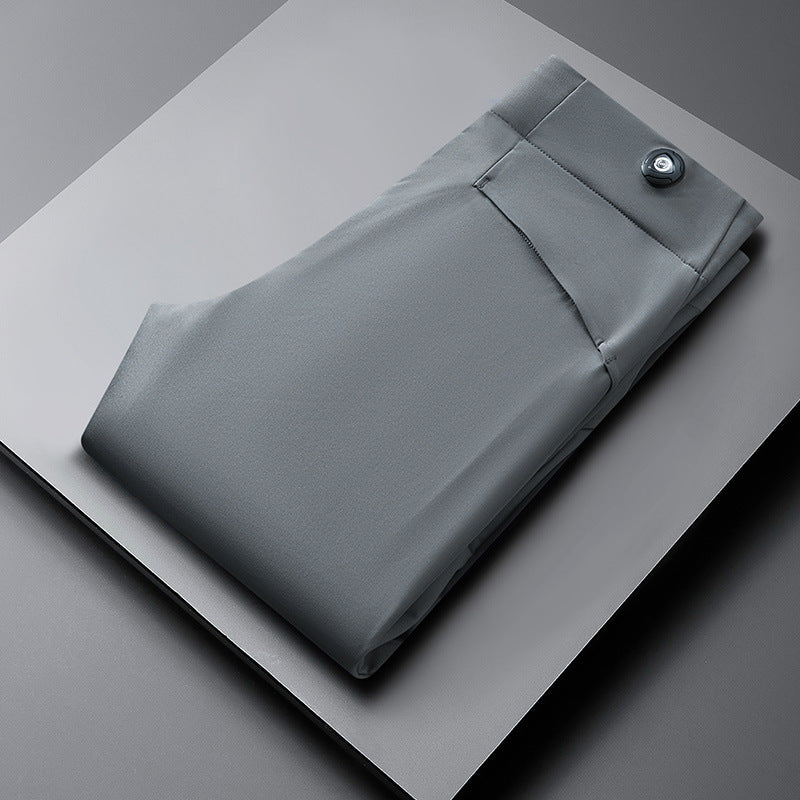 Men's slim fit performance pants in modern style, perfect for smart casual or versatile wear.