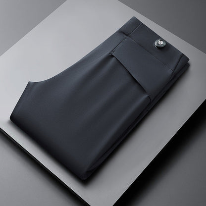 Dark gray men's slim fit trousers, tailored for comfort & performance. Ideal for casual or formal occasions.