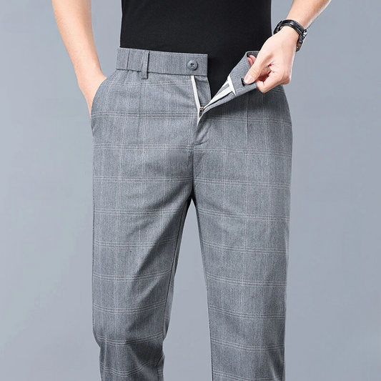 Men's slim fit plaid dress pants, tailored for a modern, sharp business casual look.