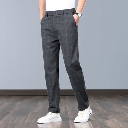 Front view of men's tailored slim fit plaid dress pants, showcasing modern fashion and comfort.