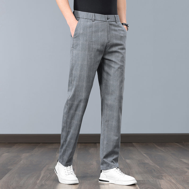 Stylish men's tailored plaid pants, a slim fit modern fashion essential for versatile wear.