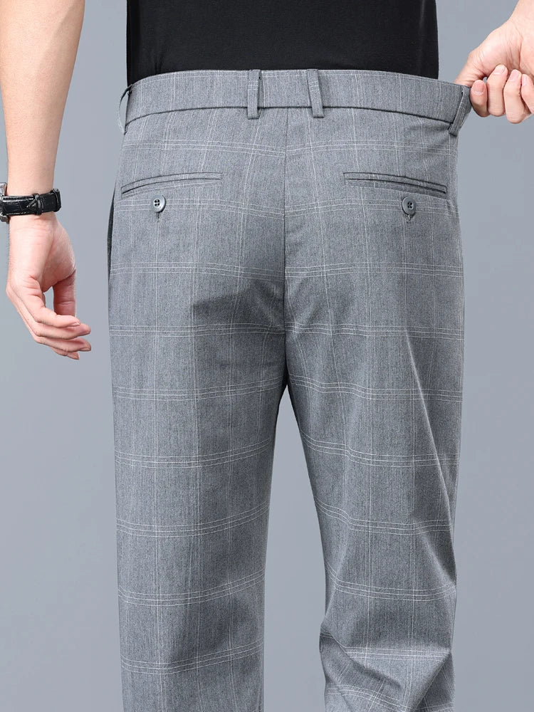 Sophisticated men's plaid dress pants, slim fit for a sleek and comfortable modern style.