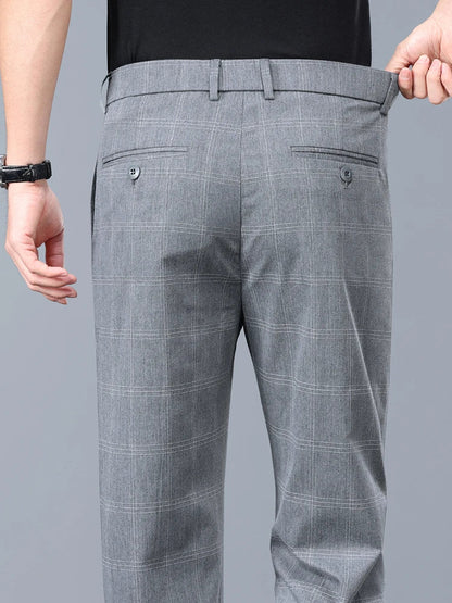 Sophisticated men's plaid dress pants, slim fit for a sleek and comfortable modern style.