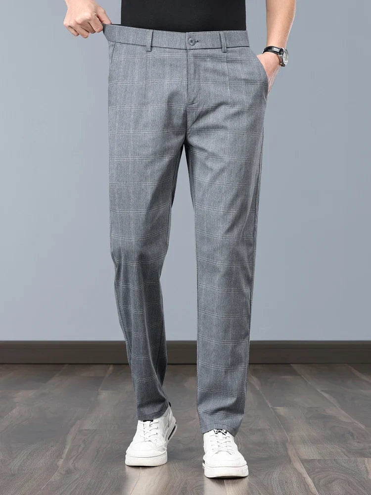 Versatile men's tailored slim fit plaid pants, great for formal events or modern everyday fashion.
