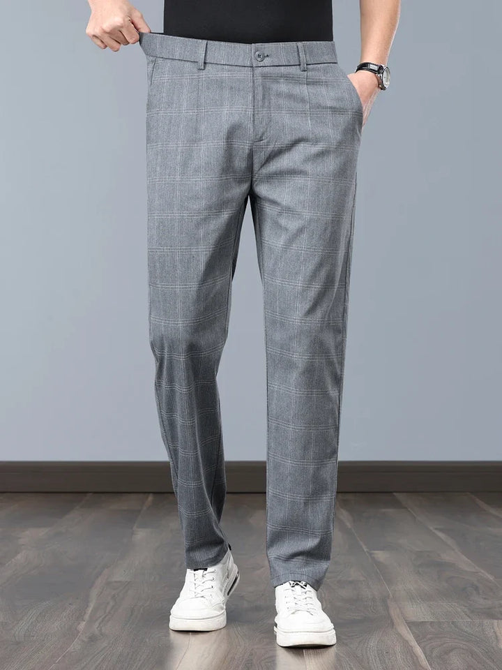 Versatile men's tailored slim fit plaid pants, great for formal events or modern everyday fashion.