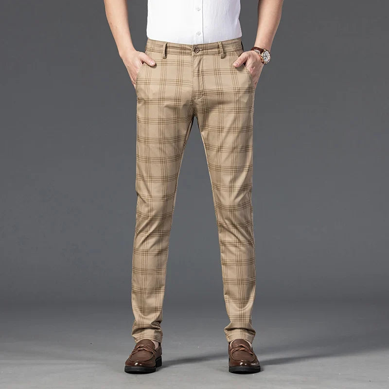 Stylish men's slim fit plaid trousers, offering a modern and confident fashion statement.