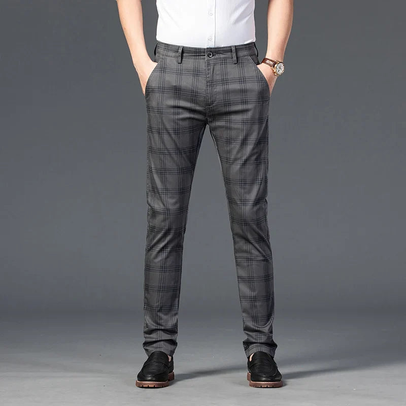 Versatile men's slim fit plaid trousers, suitable for office wear or smart casual events.