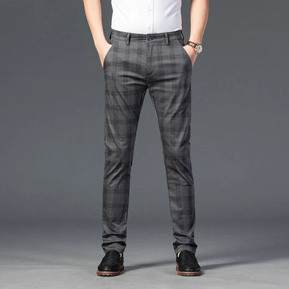 Versatile men's slim fit plaid trousers, suitable for office wear or smart casual events.