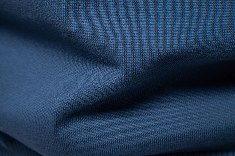 Men's V-neck sweater with ribbed detailing, perfect for a refined casual look.