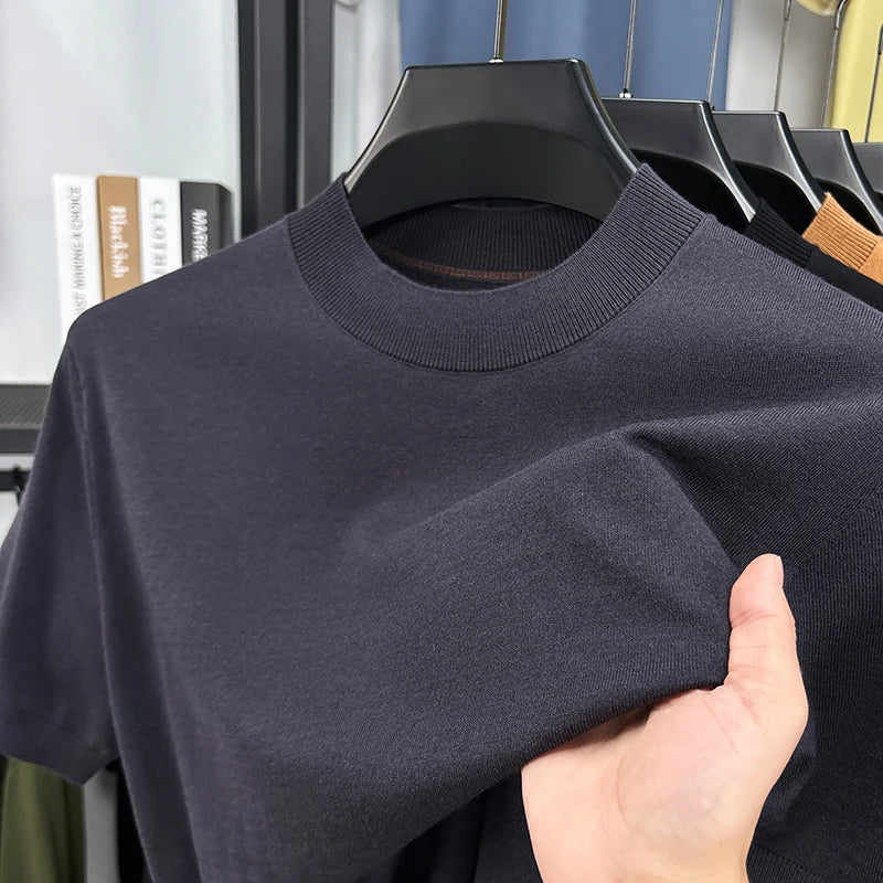 Slim fit men's casual tee with short sleeves and a sophisticated mock neck. Perfect for modern style.