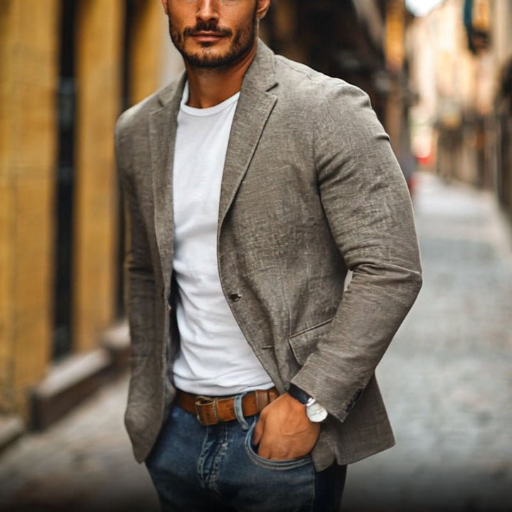 Formal men's slim fit blazer, single-breasted, ideal for modern business or smart style events. Lightweight dress jacket.