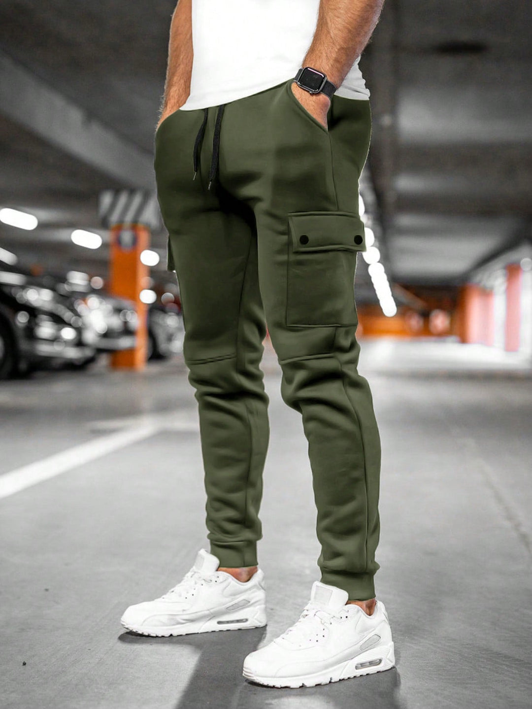 Comfortable slim-fit men's pants, streetwear design, tapered leg.