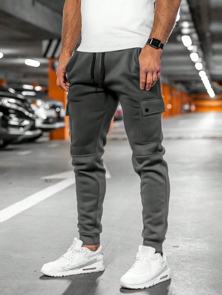 Modern men's streetwear pants, slim fit, perfect for casual fashion.