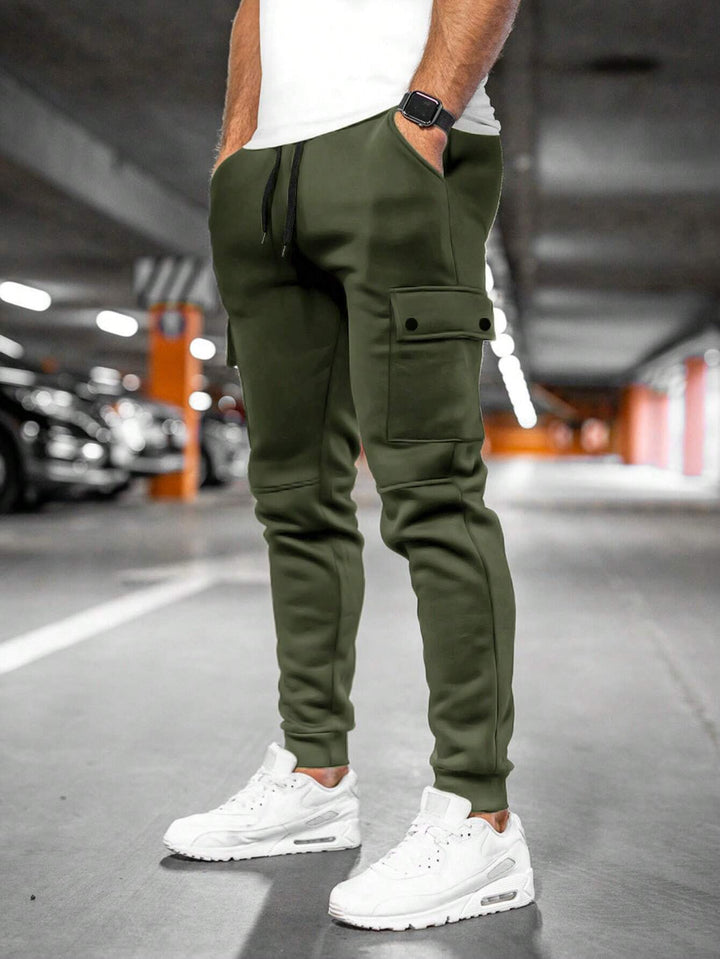 Black slim-fit men's joggers, comfortable & stylish streetwear.