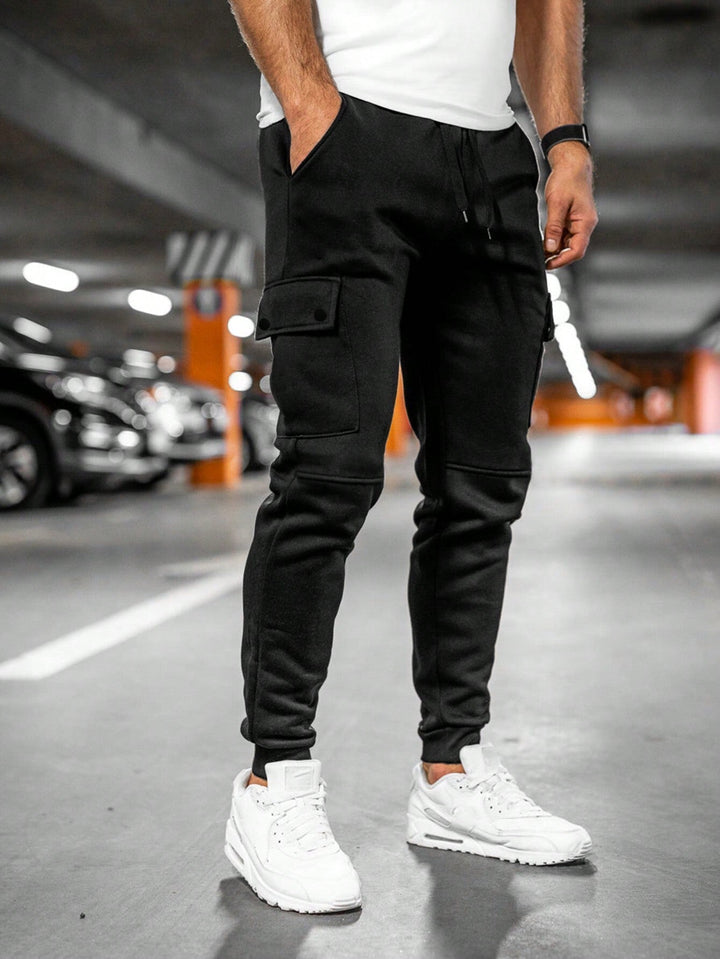 Men's casual pants, slim fit, streetwear fashion with tapered leg.