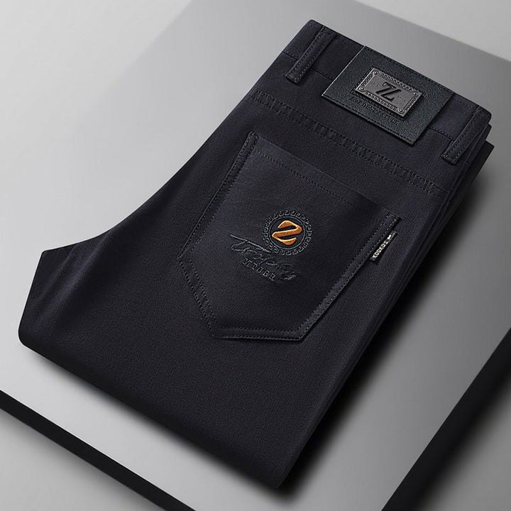 Black slim fit stretch cotton trousers for men, offering ultimate comfort and a sleek, versatile style.