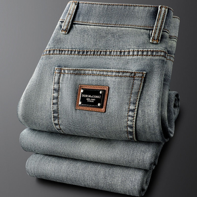 Modern men's gray slim fit stretch jeans; versatile for casual fashion & comfort.