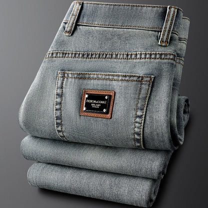 Modern men's gray slim fit stretch jeans; versatile for casual fashion & comfort.
