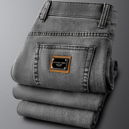Comfortable men's gray denim jeans, slim fit with stretch for daily wear.