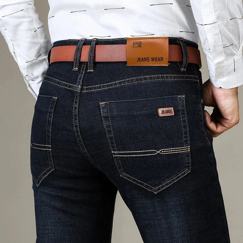 Versatile men's slim fit stretch jeans for casual wear & adaptable everyday style.