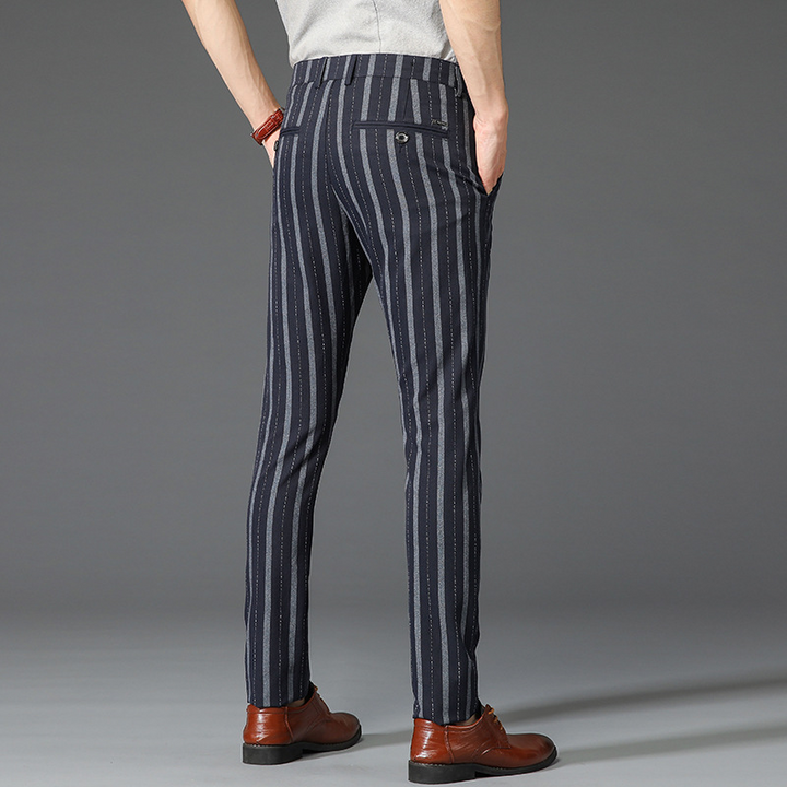 Modern men's slim fit striped trousers, a sophisticated choice for business casual and formal settings.
