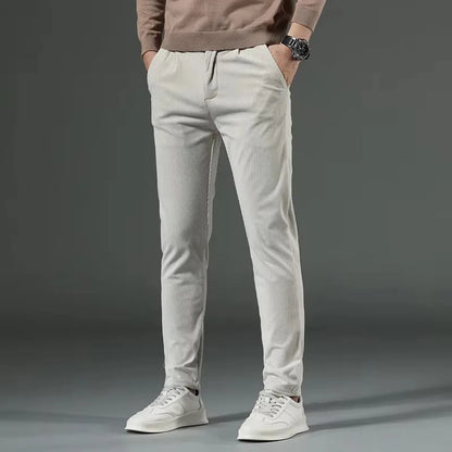 Modern men's slim fit tailored trousers, offering a sleek look with everyday comfort.