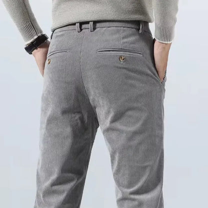 Contemporary men's slim fit tailored pants, offering comfort and a polished look for any event.