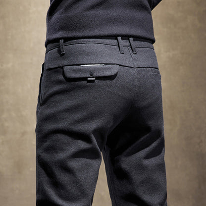 Wrinkle-resistant men's slim fit tailored pants, offering modern comfort & a sleek, polished look.