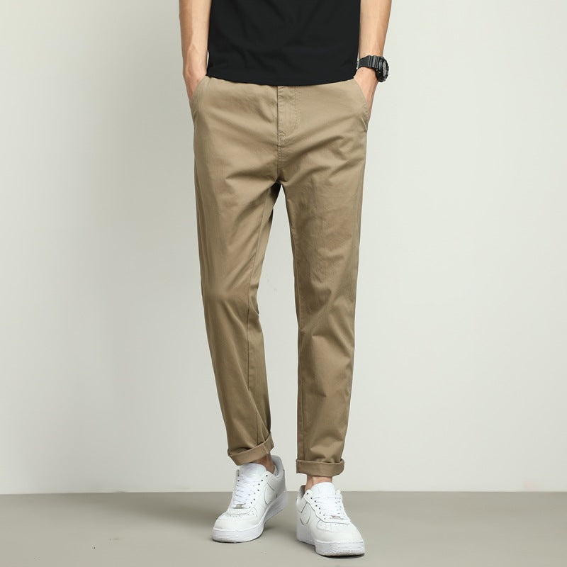 Men's slim-fit tech trousers, black, with stretch for comfort & performance.