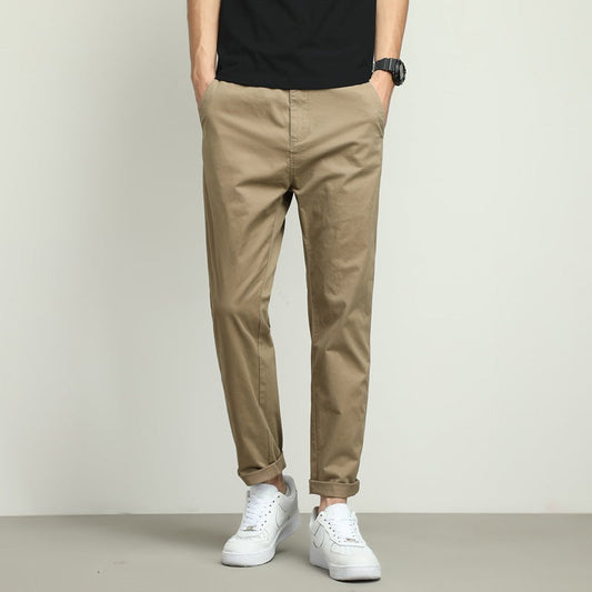 Men's slim-fit tech trousers, black, with stretch for comfort & performance.