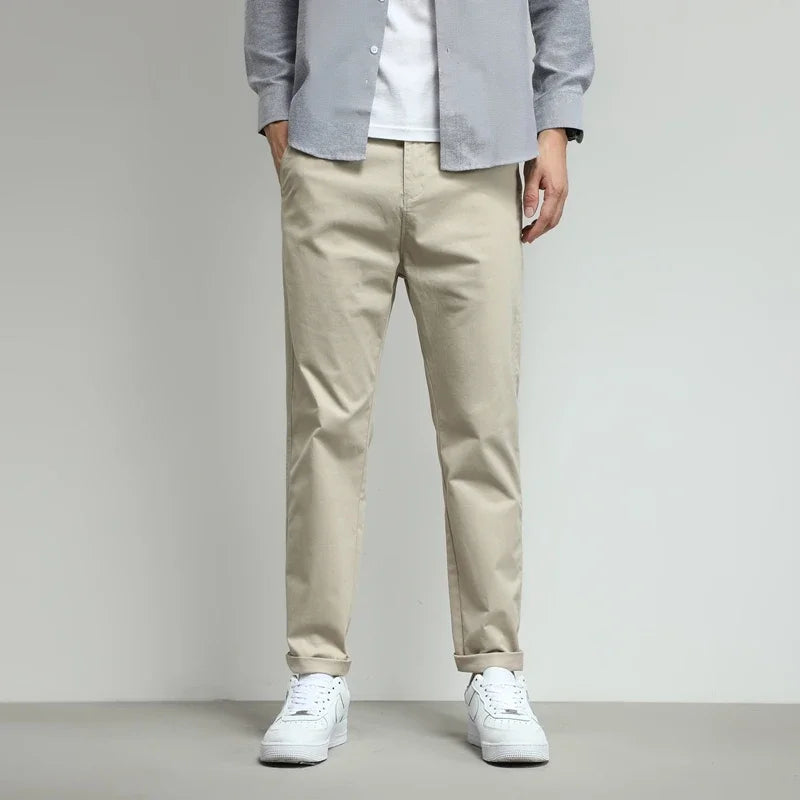 Performance men's slim-fit pants with stretch, perfect for active wear.