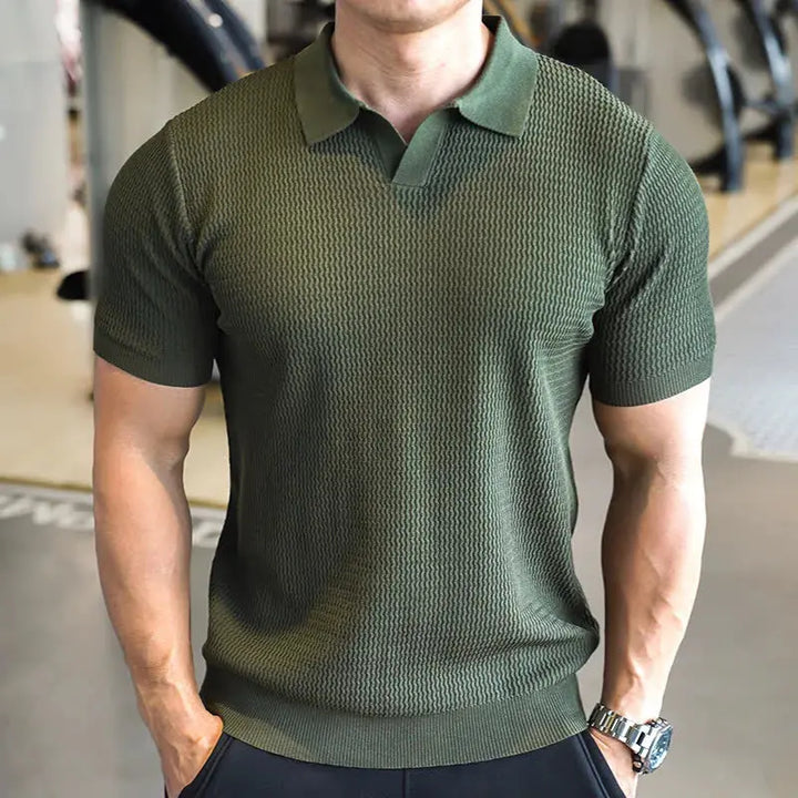 Fashionable men's slim fit polo shirt with a stylish textured design & comfortable short sleeves. Casual top.