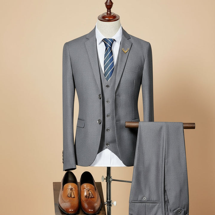Tailored men's three-piece suit, slim fit, ideal for formal wear, wedding attire, and elegant events.