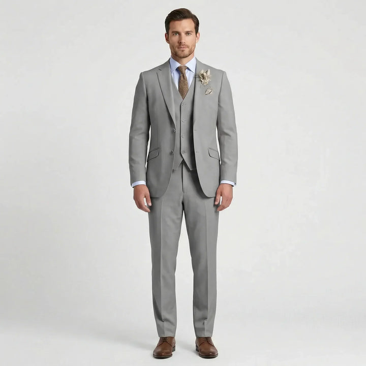 Formal men's slim fit suit. A versatile three-piece outfit for business meetings, weddings, and elegant evening wear.
