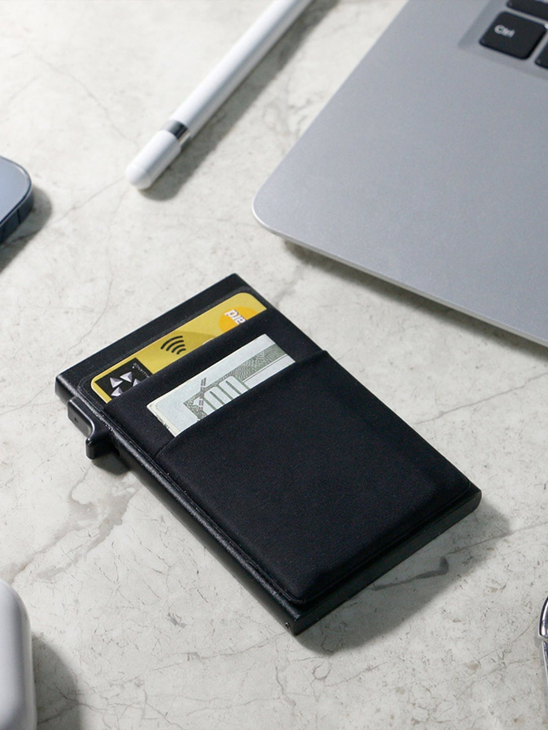 Elegant men's metal wallet, an ultra-slim RFID credit card holder for secure travel.