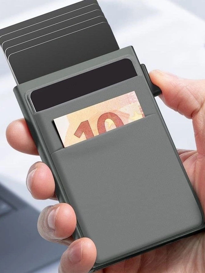 Compact men's wallet with RFID blocking, a modern slim metal credit card holder.