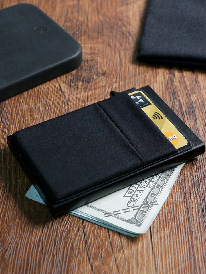 Front pocket slim wallet: men's metal credit card holder with RFID blocking technology.