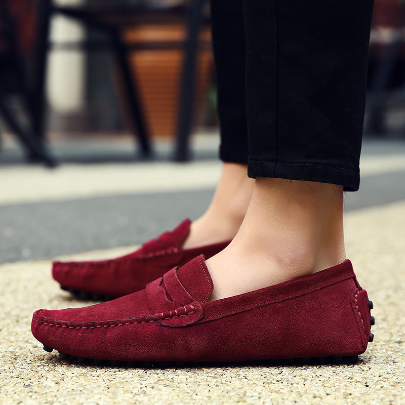 Men's slip-on loafers worn, highlighting their comfortable fit and effortless smart casual style for men.