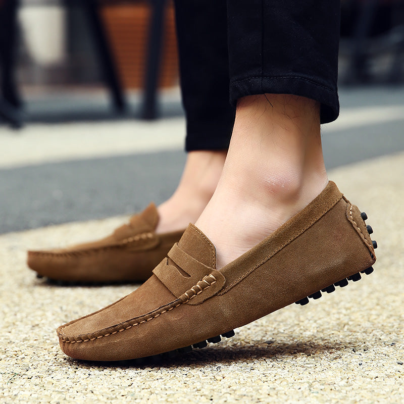 Side profile of elegant men's slip-on loafers, demonstrating versatile design and practical slip-on comfort.