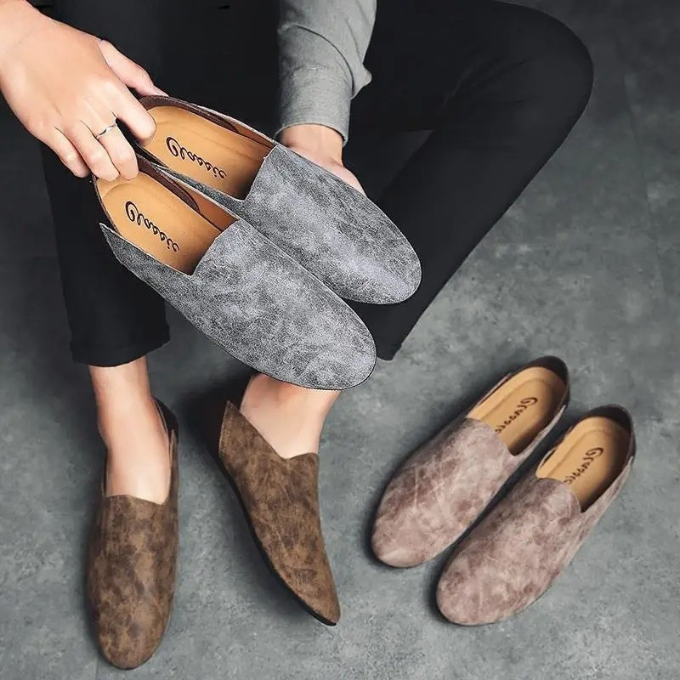 Modern men's slip-on loafers, a lightweight and comfortable choice for versatile everyday footwear.