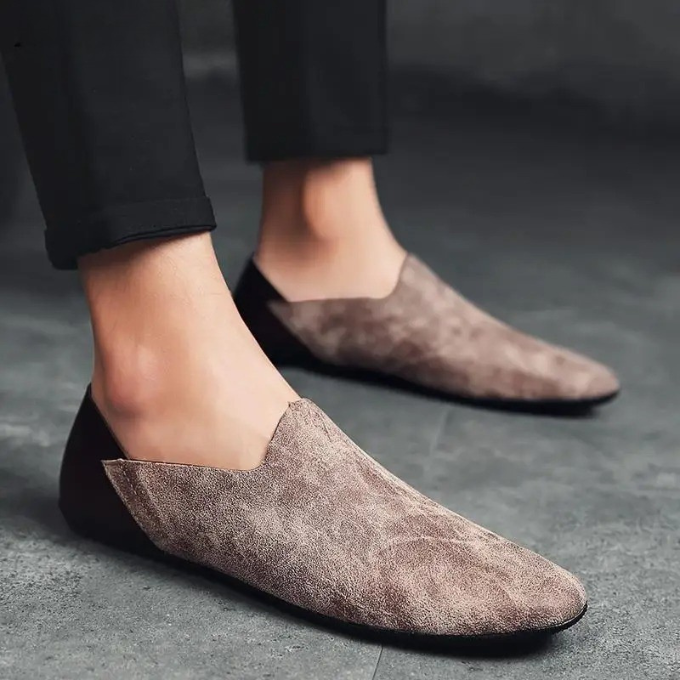 Lightweight men's slip-on loafers providing all-day comfort for casual footwear.