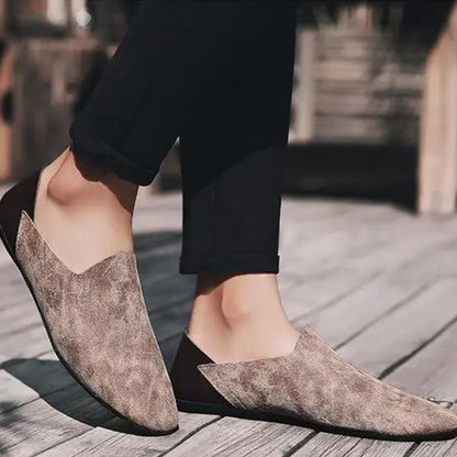 Stylish men's slip-on loafers, perfect for versatile everyday fashion and easy wear.