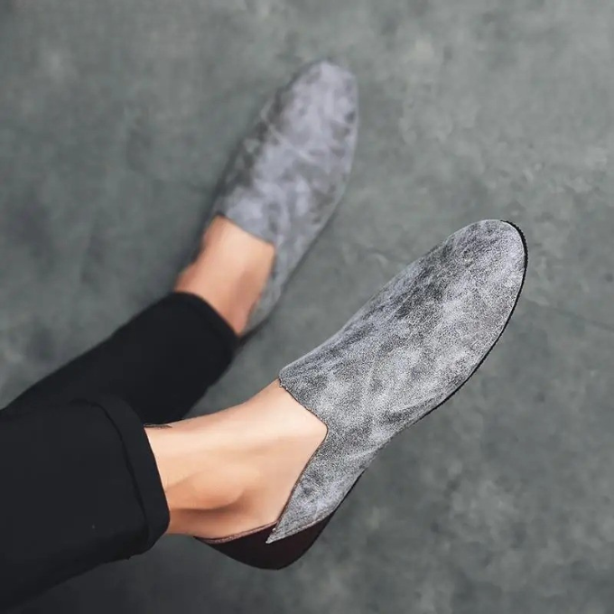 Smart men's slip-on loafers, offering lightweight comfort for modern fashion.