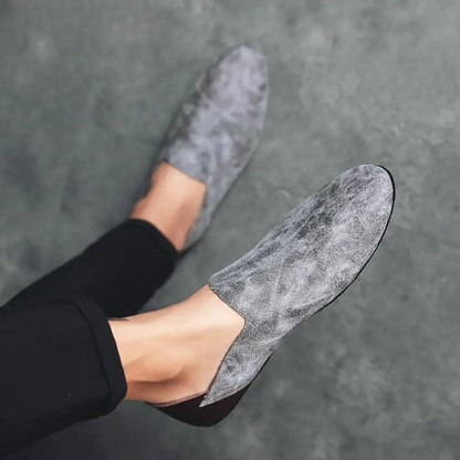 Smart men's slip-on loafers, offering lightweight comfort for modern fashion.