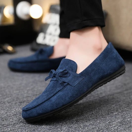 Men's slip-on loafers with elegant bow detail. Perfect for everyday comfort and casual style.