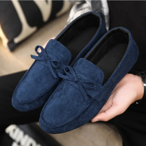 Comfortable slip-on men's shoes with bow detail. Ideal for daily wear, blending fashion & ease.