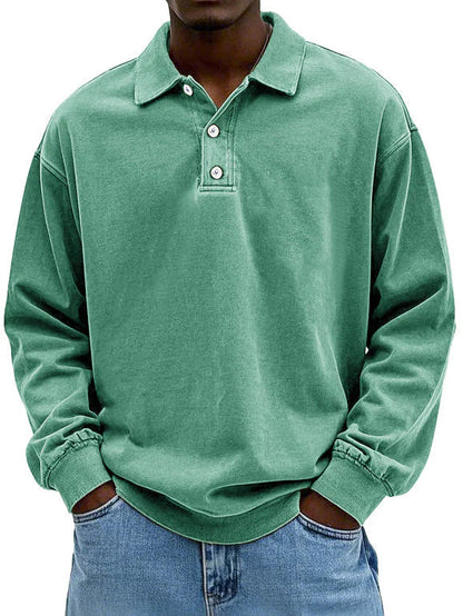 Relaxed fit men's long-sleeve polo shirt featuring a button placket, ideal for smart-casual style.