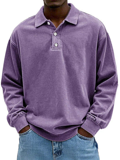 Detailed view of a men's smart-casual long-sleeve polo shirt, highlighting fabric and button placket.